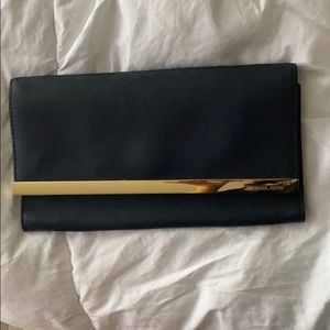 MICHAEL KORS off shoulder and clutch